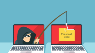 Zwei Laptops mit einen Dieb, der Daten klauen möchte